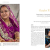 A woman in a vibrant purple sari with gold accents smiles, while on the right, another from Kala Raksha Vidhyalaya embroiders fabric—an image featured in "Artisans by Design" by Schiffer Publishing, Ltd., with text sharing her story.