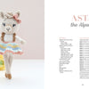 A crocheted alpaca doll in a pastel tutu and bow stands on one leg by a yellow flower; on the right is the book "Sweet and Simple Amigurumi Friends" from Schiffer Publishing, Ltd., featuring amigurumi patterns and instructions.