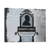 The book cover for Memento Gorey by Schiffer Publishing, Ltd. shows a black profile silhouette of a man, handwritten notes, and rare unpublished photographs in the background.
