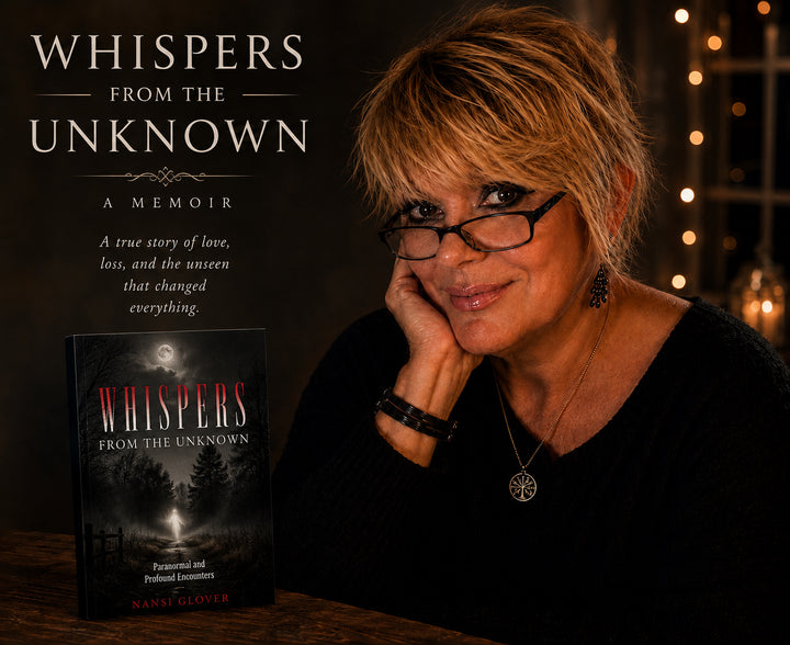 A woman with glasses rests her chin on her hand beside a copy of her memoir, Whispers from the Unknown, which features a dark forest scene reflecting her research into haunted locations and ghost encounters.