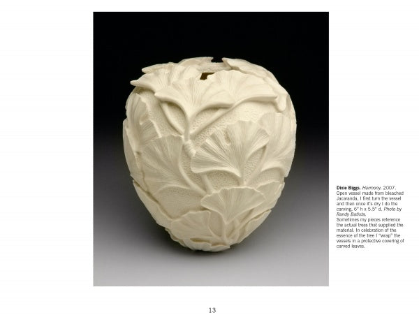 Wood Art Today 2 by Schiffer Publishing, Ltd. features a cream-colored, intricately carved apple-shaped vessel adorned with delicate ginkgo leaf patterns, highlighting exquisite wood craftsmanship on a simple white background.