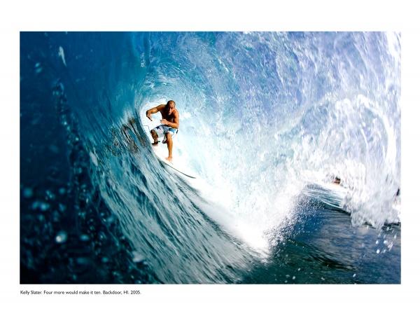 In "Flying Through the Clouds" by Schiffer Publishing, Ltd., a surfer skillfully rides within a curling blue wave, white water spraying around him—capturing the intensity and thrill of surfing up close.