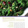 A plate of braised kale with dried cranberries and pine nuts, inspired by seasonal recipes from "The Farmer's Market Guide" by Schiffer Publishing, Ltd., with ingredients and steps shown below the image.