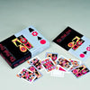 The High Deck by Schiffer Publishing, Ltd. is displayed with its box, showcasing abstract, colorful designs. Several cards are spread out, revealing bold geometric artwork—iconic symbols in this unique card deck.