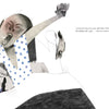 In The Two Fridas by Schiffer Publishing, Ltd., a child in a blue polka-dot nightgown yawns and stretches in bed, while another child sits nearby and a doll lies under the covers in this beautifully illustrated picture book.