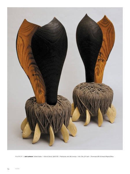 Turning to Art in Wood by Schiffer Publishing, Ltd. showcases sculptural chairs with dark, curved wooden backrests, textured seats like woven roots, and claw-like legs—pieces reminiscent of a top wood museum collection.