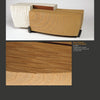 Two modern, rectangular sculptures from "Mind & Hand" by Schiffer Publishing, Ltd. feature layered textures: one white with linear carvings, the other brown with wood grain rings. Both are shown on a dark background, with a close-up detail below.
