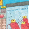 A family of three—two kids and a woman—smile as they walk by a seafood counter. In a tank, red lobsters with wide eyes watch them, reminiscent of the playful crustaceans in "Lobsters on the Loose" by Schiffer Publishing, Ltd.
