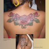 A person with braided hair and yellow hoops displays a colorful three-rose tattoo on dark skin, seen in "Ink in the Hood" by Schiffer Publishing, Ltd. An inset shows a black and gray rose tattoo with “Sharon” on an upper arm.