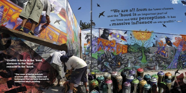 A person with a covered head spray-paints a mural on a wall, surrounded by spray cans, in true Santiago street art style. "Street Art Santiago Chile" by Schiffer Publishing, Ltd. captures vibrant graffiti and bold quotes about graffiti culture.